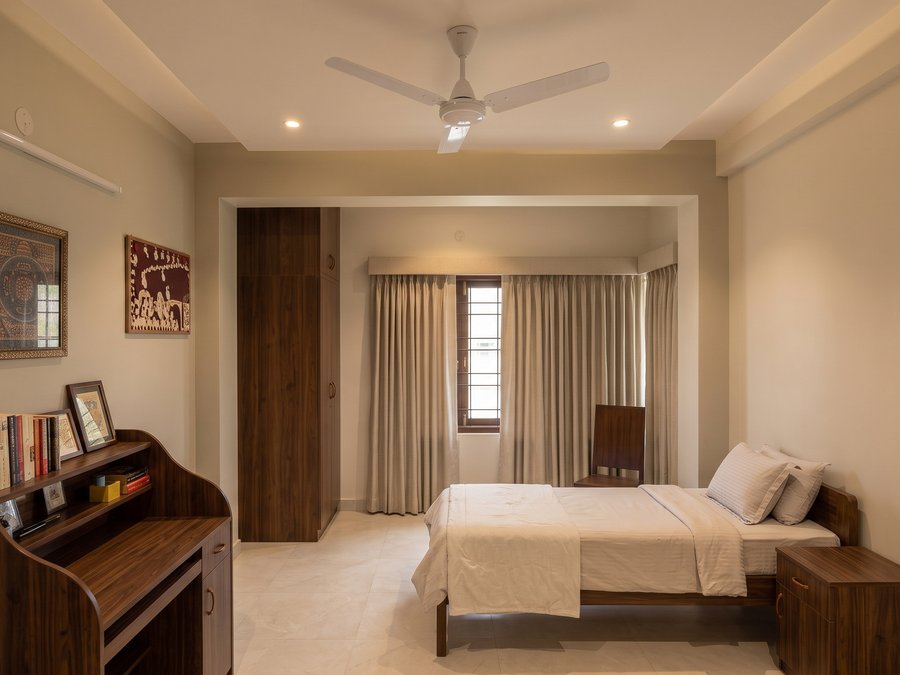 A study bedroom in walnut-toned joinery (visualisation)